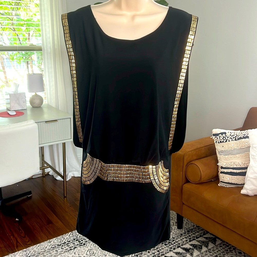 Worn Once Renee Collection dress. Beautiful gold detailing like new size small